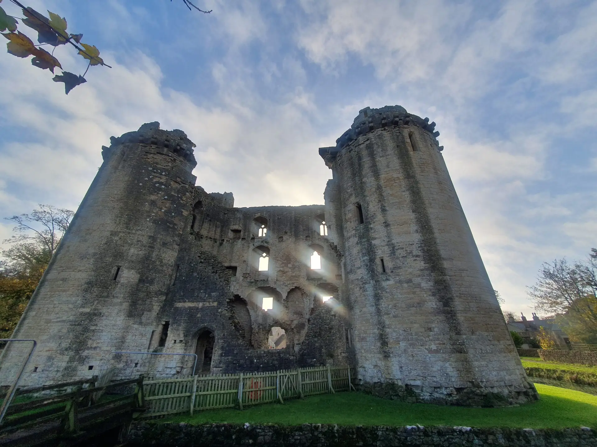 Nunney Castle, moated medieval castle ruin in the village of Nunney, Somerset, England.