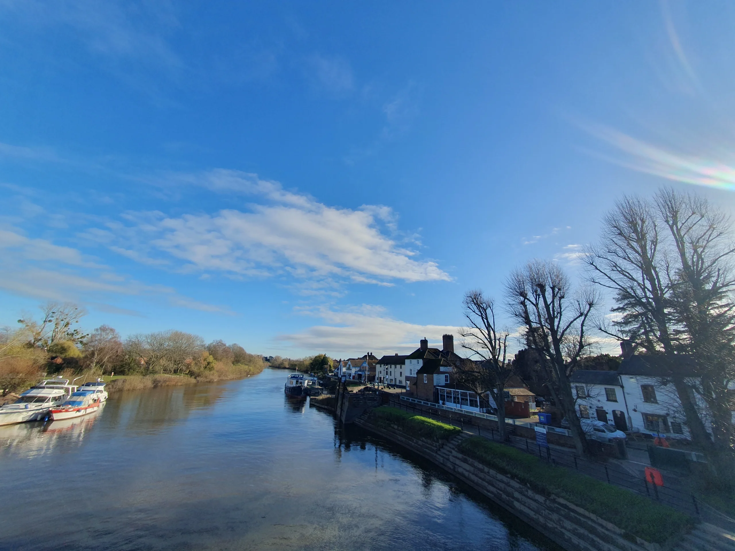 Upton Upon Severn 10 Took a picture from the bridge crossing the Severn river with boats banked either side.