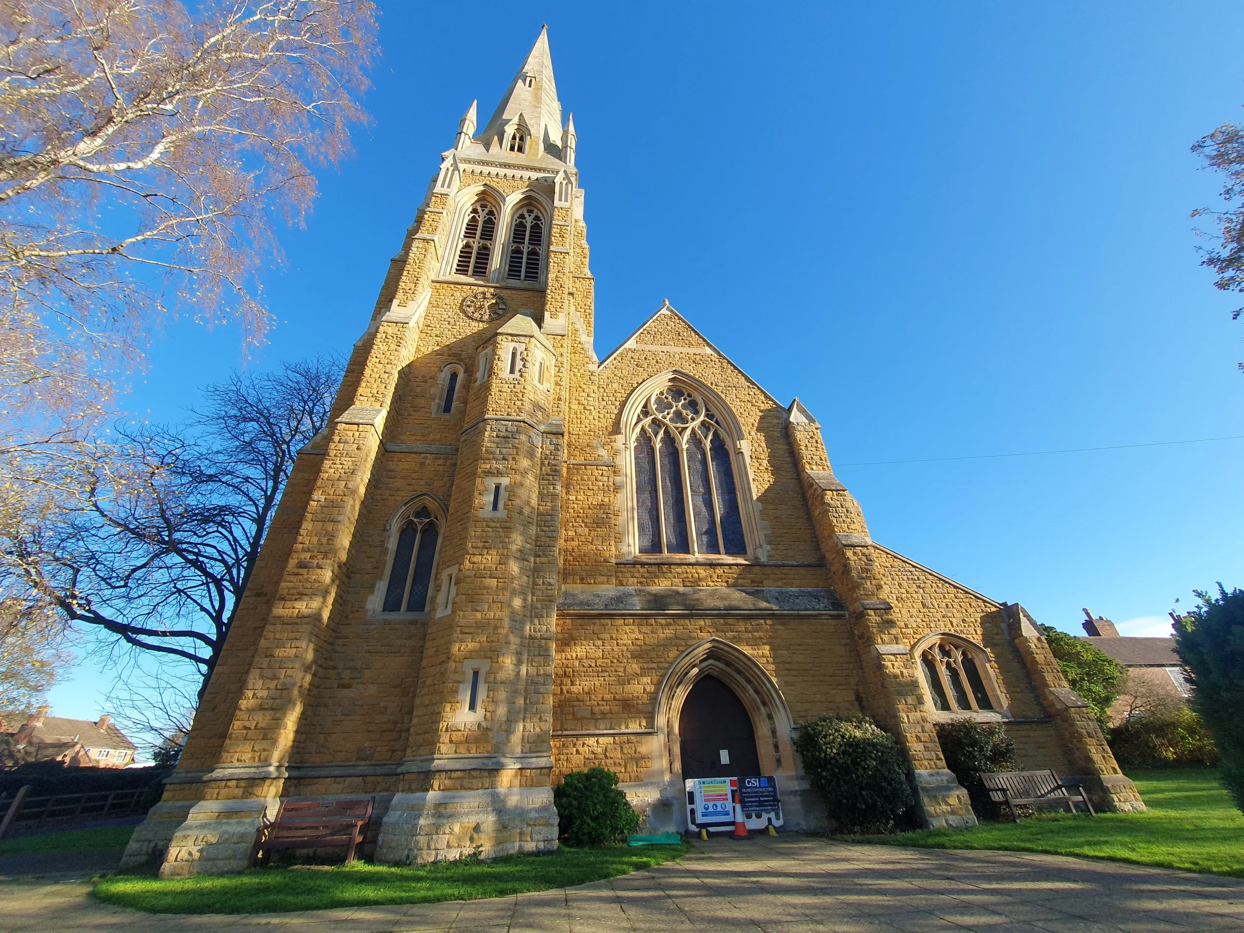 Upton Upon Severn 11 The image of the church from the outside - yellow limestone looking.